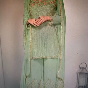 Embroidered Pakistani suit in green